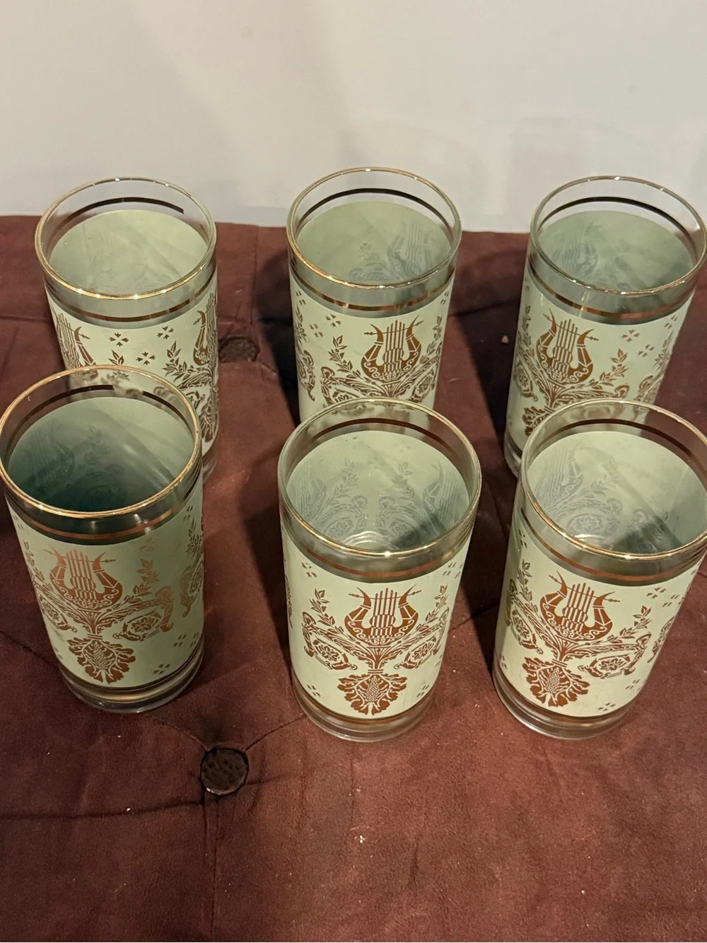 Set of 6 glasses vintage green and gold design. Holds 8 ounces
